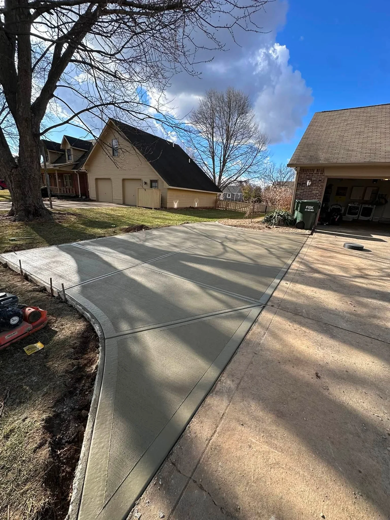 Finished concrete driveway by Legacy Concrete and Design
